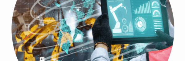 Technician uses a tablet to monitor a robotic arm in a high-tech factory with a holographic world map.
